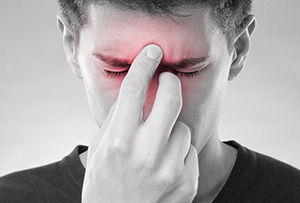man with Sinus headache